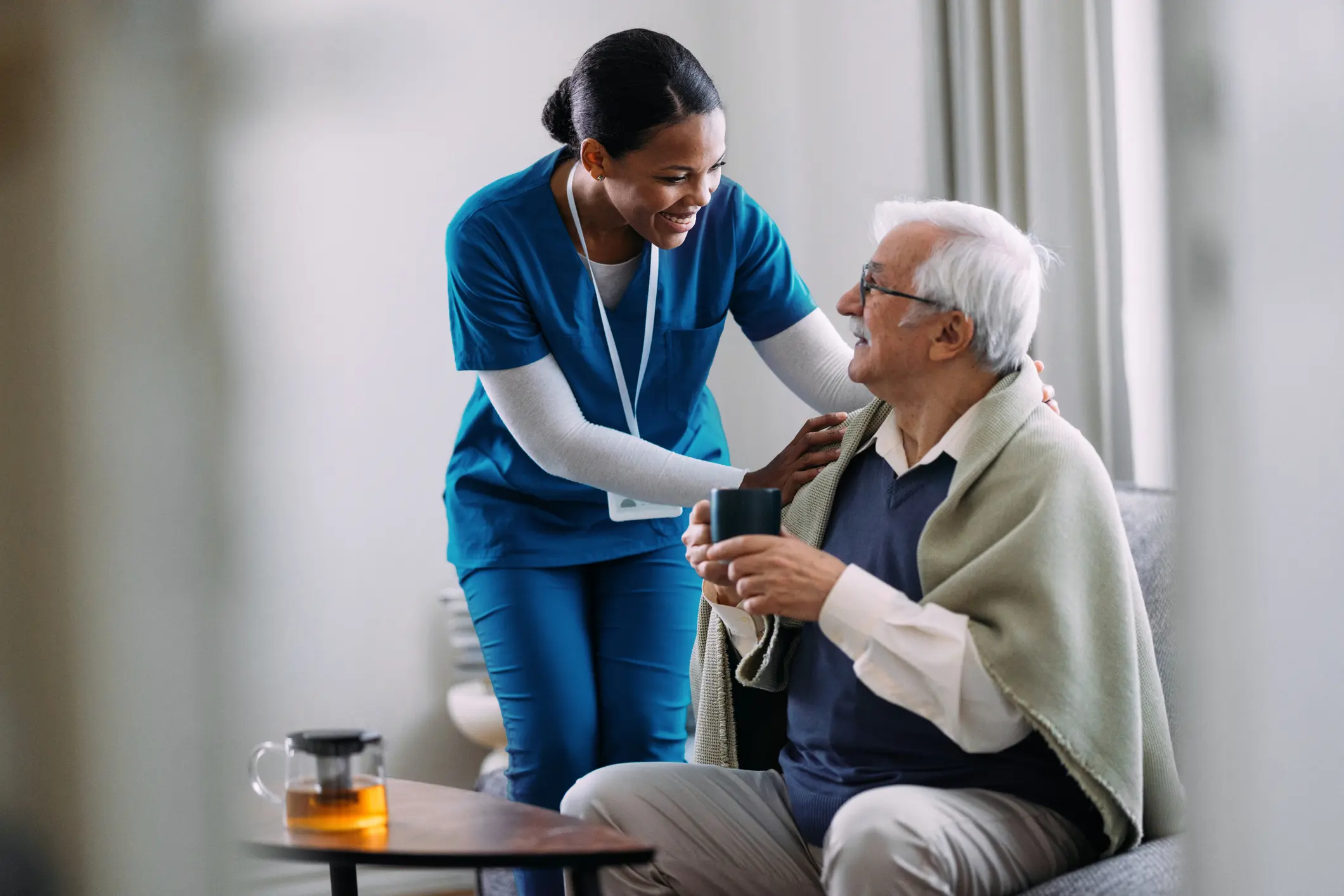 home care services in manhattan, nurse taking care of an elderly man