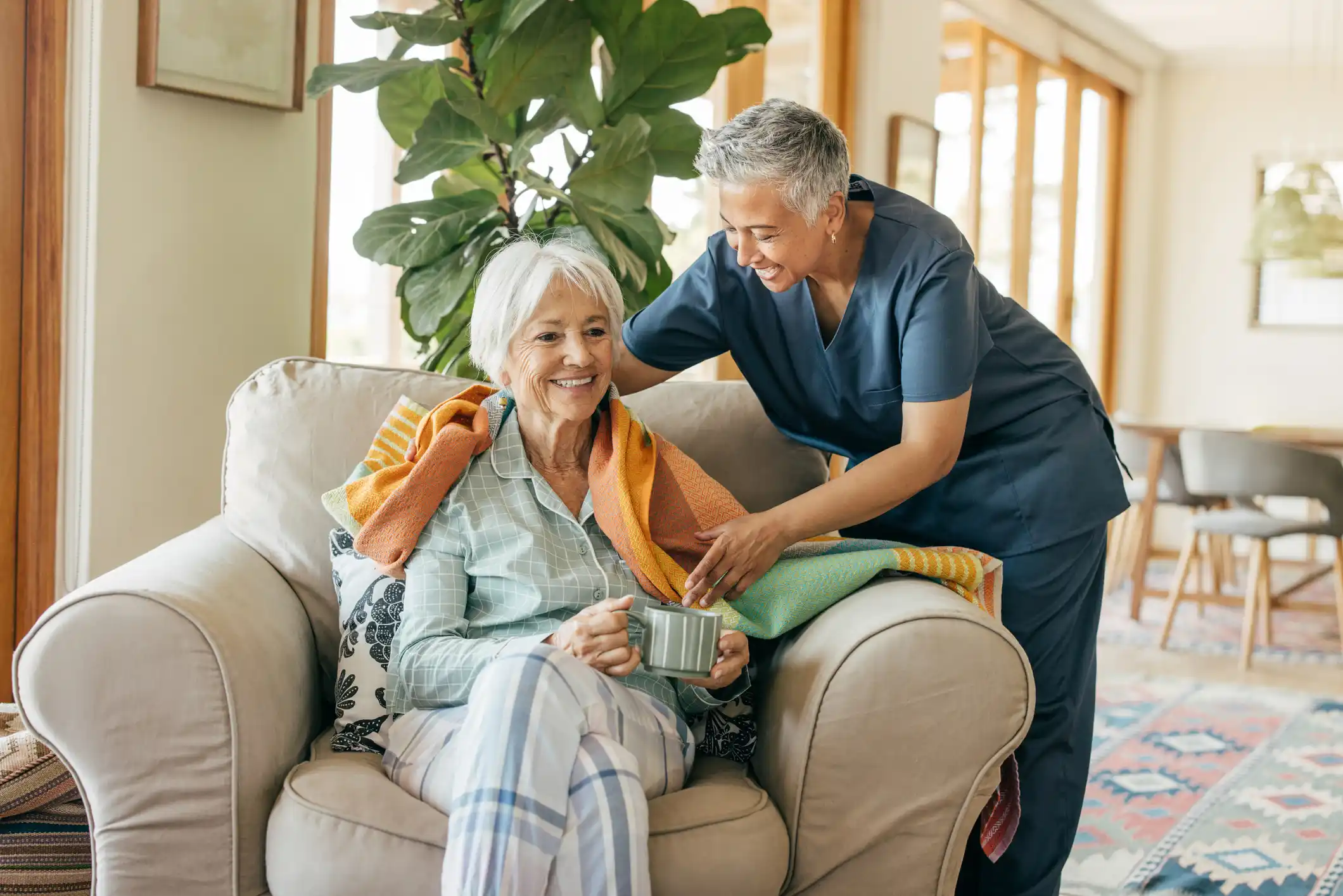 nurse taking care of an elderly lady in her home in nyc